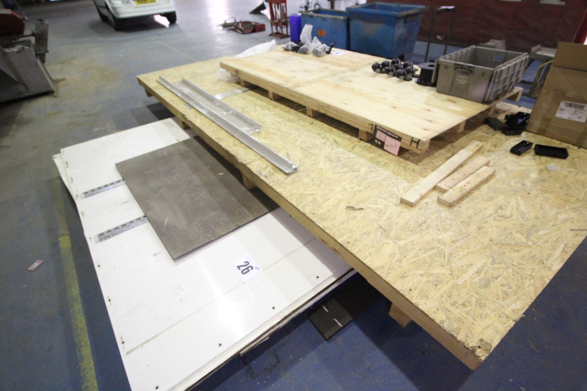 STACK OF LARGE, TIMBER PALLETS, COMMERCIAL VEHICLE BODY PANELS