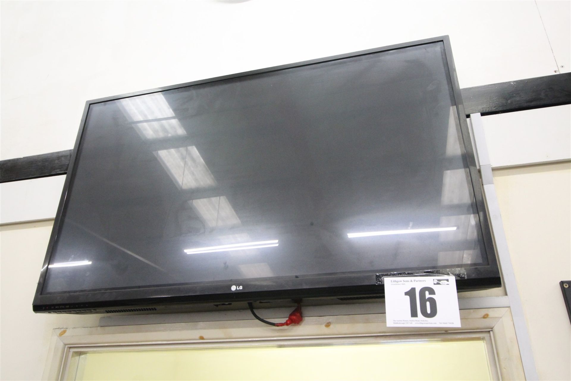 LG, Black Cased, Flat Screen TV, Approximately 51" Corner-to-corner, with Remote.