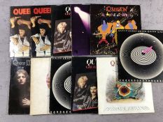 11 Queen LPs/12" including: "Greatest Hits", "A Night at the Opera", "I'm Going Slightly Mad", "