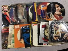 29 Coloured Vinyl and Picture Discs to include Elvis Presley, Poison, Mel and Kim, UK Subs etc