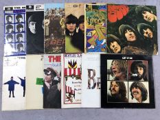 The Beatles: 13 LPs including: "Let It Be", "Abbbey Road", "Rubber Soul"(Portuguese pressing), "