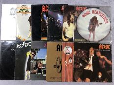12 AC/DC LPs/12" including: "Heatseeker" (12" picture disc), "If You Want Blood", "Highway to Hell",