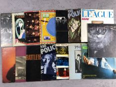 15 Punk/New Wave LPs/12" including: Cocteau Twins, Devo, The Police, U2, Talking Heads, Ian Dury