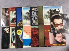 15 Elvis Costello LPs/12" including: "Armed Forces", "Punch the Clock", "This Year's Model", "