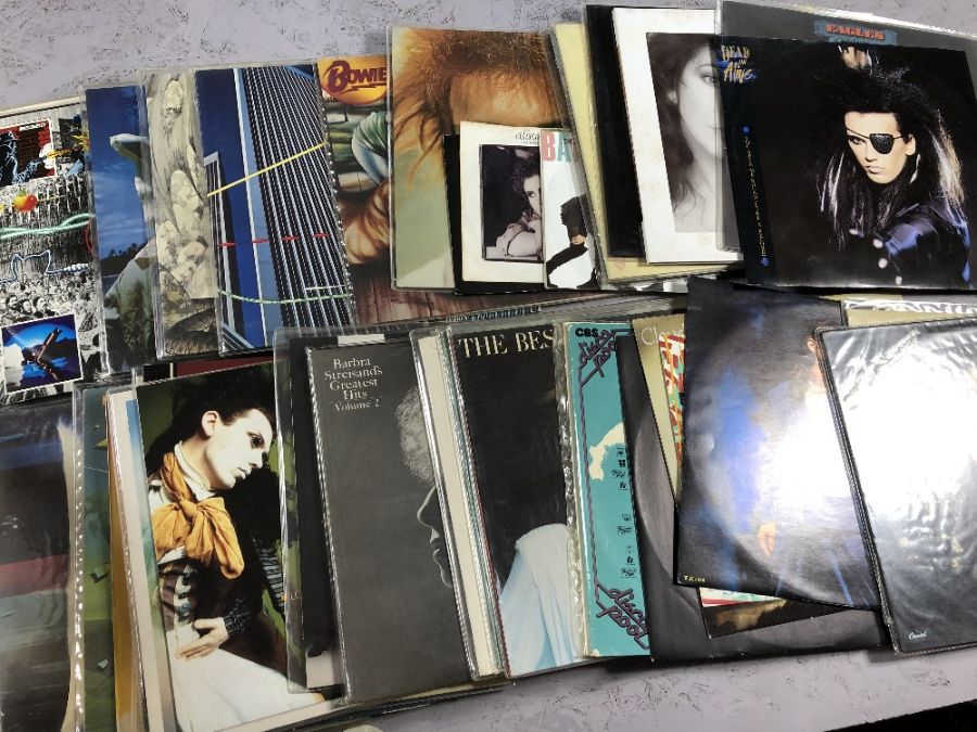 Large collection of albums to include David Bowie, Yes, The Who, 10CC, Eric Clapton, Supertramp,
