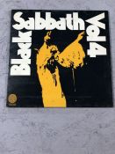 Black Sabbath "Vol. 4" LP on the Vertigo "swirl" label 6360 071. Comes with attached booklet and