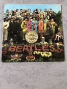 The Beatles "Sgt. Pepper's Lonely Hearts Club Band" LP. Original UK Parlophone first mono pressing