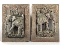 Pair of hardwood framed carvings depicting, in relief, figures riding elephants, possibly Thai, each