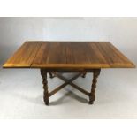 Oak extending dining table with barley twist legs and cross stretcher, approx 91cm x 91cm unextended