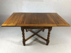 Oak extending dining table with barley twist legs and cross stretcher, approx 91cm x 91cm unextended