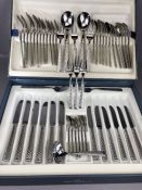 Boxed set of Villeroy and Boch stainless steel cutlery with chequered pattern to handles, 53 pieces,