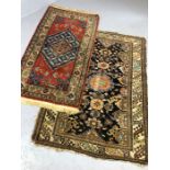 Two small Eastern wool rugs, the largest approx 155cm x 108cm