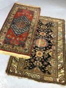 Two small Eastern wool rugs, the largest approx 155cm x 108cm