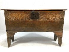 Small 17th Century oak plank coffer with single plank hinged lid, with carved detailing, approx