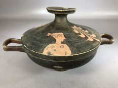 Greek Lekanis: Lidded bowl and plate on pedestal foot with two handles, painted clay with black