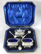 Silver Hallmarked Cruet set comprising Mustard and two salts with three spoons in presentation box