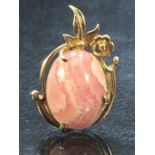 Highly polished Pink and white stone in unmarked gold metal mount (9ct)/ pendant marked D903.