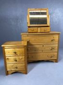 Modern pine chest of three drawers with brass handles and matching mirror with two drawers, chest