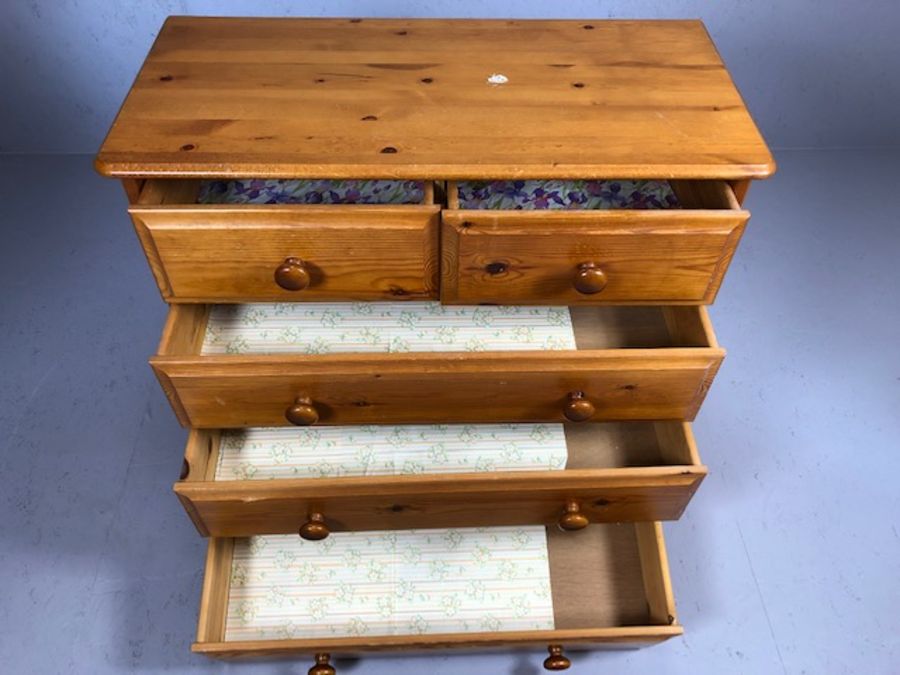 Modern pine chest of five drawers on bun feet, approx 85cm x 39cm x 80cm tall - Image 2 of 3