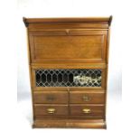 Sectional Globe Wernicke style unit with drop down bureau, glass fronted cupboard and four drawers