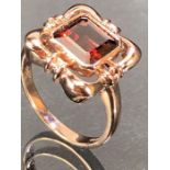 9ct Hallmarked Rose Gold ring with square cut central faceted red Garnet stone approx 7.5mm square
