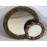 Two circular carved wooden framed mirrors the largest 41cm in diameter