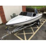 Speedboat: A Black Max Fletcher Speed boat on a road/ launch trailer with a YAMAHA 60HP outboard