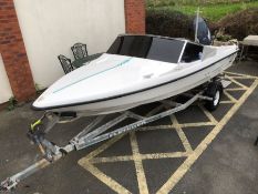 Speedboat: A Black Max Fletcher Speed boat on a road/ launch trailer with a YAMAHA 60HP outboard