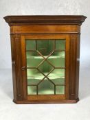 Fine detailed corner cupboard in mahogany with painted shaped shelves and glass door approx 66cm