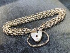 Silver London Hallmarked three strand circular linked Bracelet with Heart shaped Lock maker LC