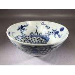 Blue and white ceramic bowl, possibly Korean, signed to base, approx 16cm in diameter