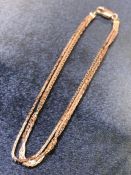 9ct Rose gold three strand Bracelet approx 23cm long and approx 5.1g