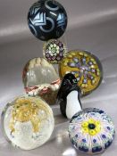 Good collection of glass paperweights to include Caithness, Murano, a Langham penguin etc (7)