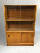 Mid Century shelving unit with cupboard under, approx 75cm x 30cm x 112cm tall