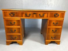 Modern twin pedestal leather-topped desk, with key, approx 122cm x 61cm x 77cm tall