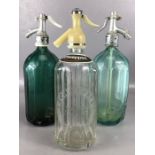 Collection of three vintage soda siphons, one by Schweppes