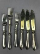 Six hallmarked fish forks and knives, silver Sheffield hallmarked handles and EPNS blades