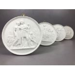 Collection of four Royal Copenhagen blanc de chine wall plaques with depicting classical scenes,