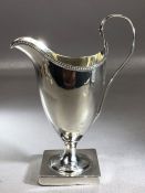 Hallmarked George IV Silver London 1795 cream jug in square base with beaded rim approx 14.5cm