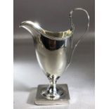 Hallmarked George IV Silver London 1795 cream jug in square base with beaded rim approx 14.5cm