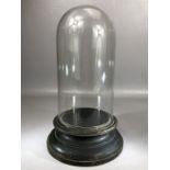 Vintage glass display dome on wooden base, approx 34cm in height