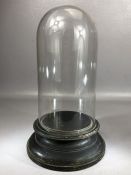 Vintage glass display dome on wooden base, approx 34cm in height