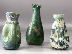 Collection of three glass bottles, possibly Roman, of various designs, the largest approx 11cm in