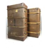 Two good vintage wooden bound travel trunks, one with Sidmouth and Ilfracombe travel labels, the