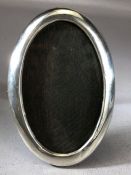 Oval Silver Antique frame with wooden back and stand approx 15 x 10cm