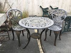 Metal garden bistro set comprising circular table approx 71cm in diameter and two chairs