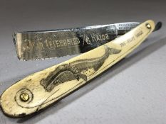 19th century whaler's scrimshaw bone and steel cut throat razor, worked on both sides, one side a