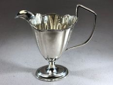 George IV Hallmarked Silver creamer on oval lead weighted base London 1825 approx 10.5cm tall