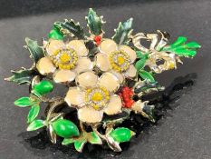 Silver and Hand painted Brooch depicting a Xmas wreath with flowers and holly approx 7cm in length