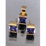 Earring and pendant set on 9ct Gold mounts with faceted Tanzanite Gemstones